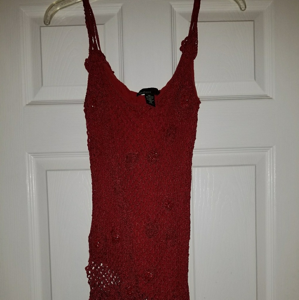 Red asymmetrical knit shirt